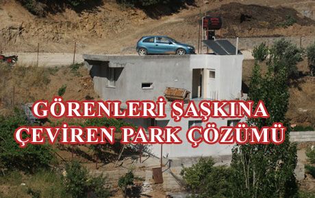 OTOMOBİLİNİ EVİNİN DAMINA PARK EDİYOR